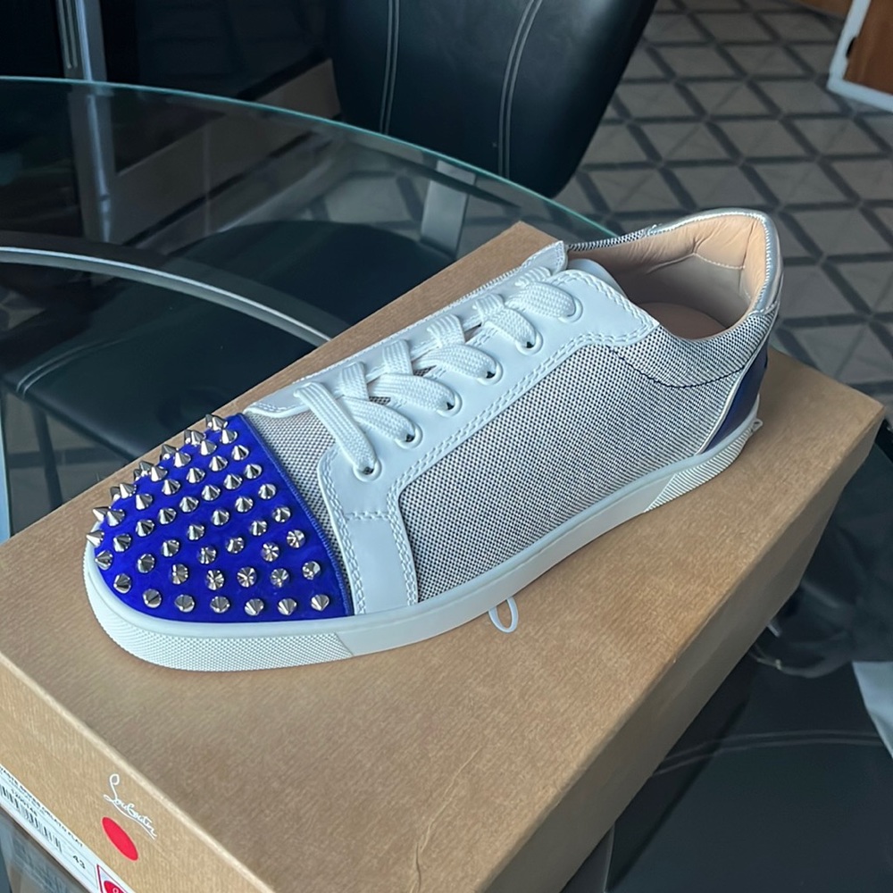 Brand new Christian Louboutin spike sneakers. Never worn. (sold out everywhere)
